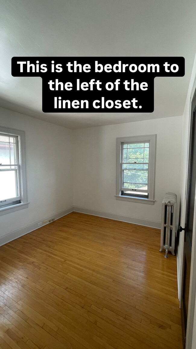 View of bedroom 1 from hallway, standing near linen closet. - 4235 Pleasant Ave