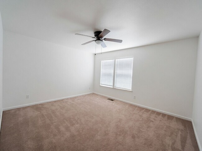 Building Photo - Spacious 4-Bedroom Home with Solar, Finished Garage, Large Pantry & Low-Maintenance Backyard in M...