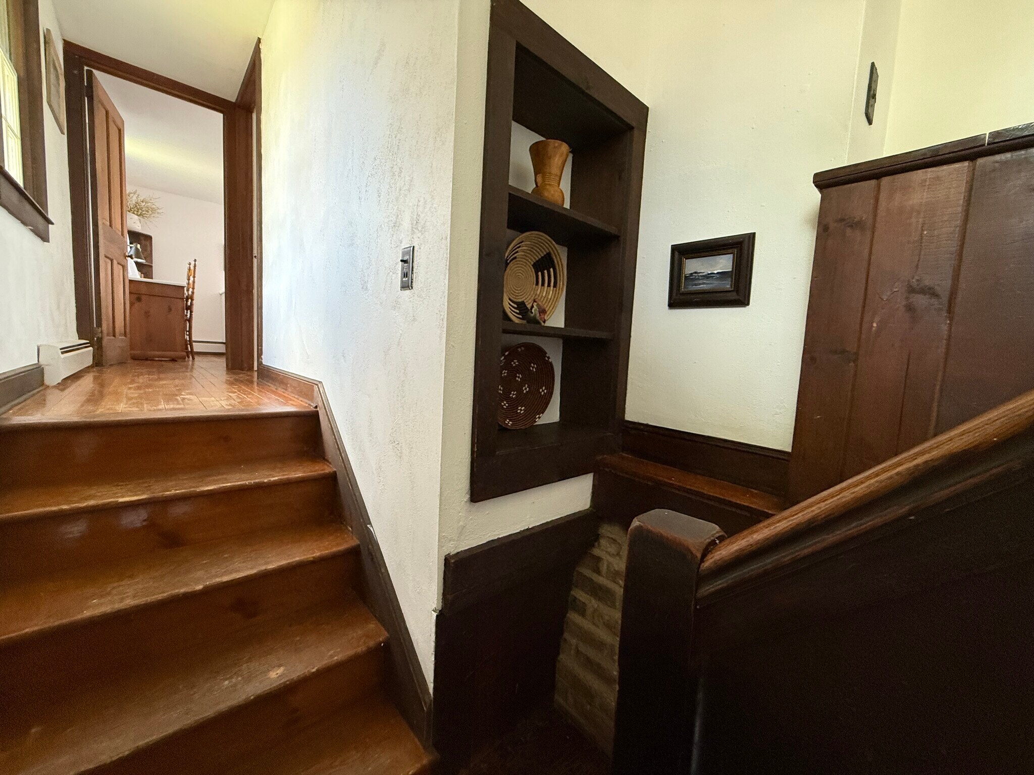 Steps to the left lead to the bedrooms and steps to the right lead to bathroom and kitchen-li - 32 Meadow St