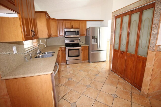 Building Photo - Northwest 57th Court, Hialeah, FL 33015 - ...