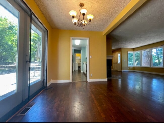 Building Photo - Updated Ranch with Large Fenced Yard, Tucked Off Walker Road~ Gas Fireplace~ Great Natural Light~...