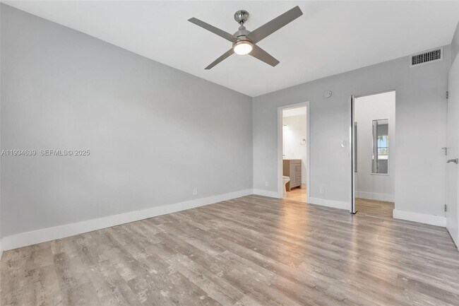 Building Photo - 1400 NE 57th Ct