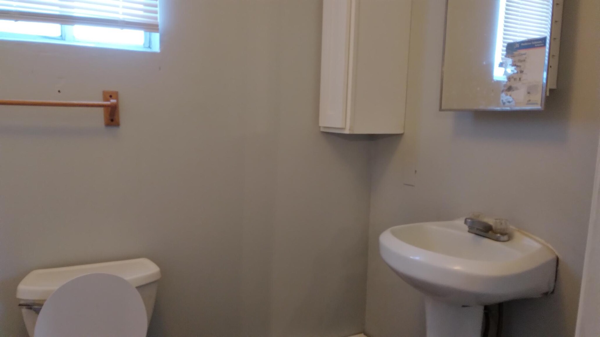 Bath with tub/shower, toilet, sink, cabinet - 201 Churchill St