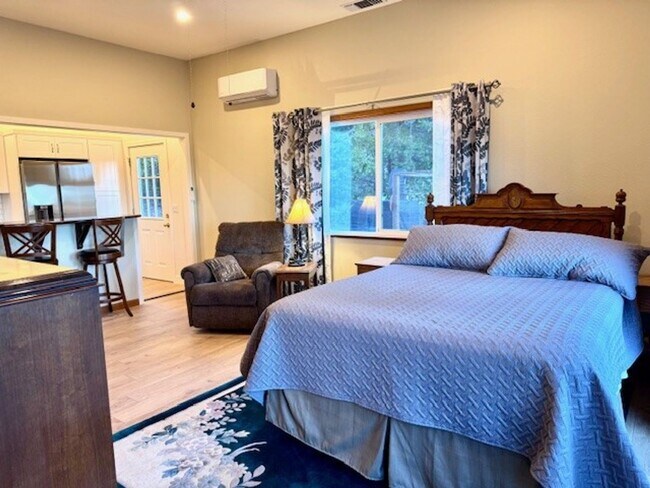 Building Photo - Beautiful Fully Furnished Studio Apartment with Long Range Views