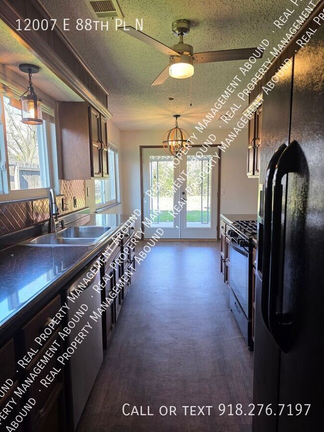 Building Photo - 12007 E 88th Pl N