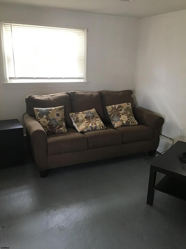 Building Photo - 9317 Monmouth Ave