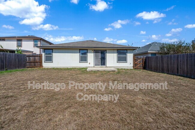 Building Photo - 4935 Dahlia Terrace