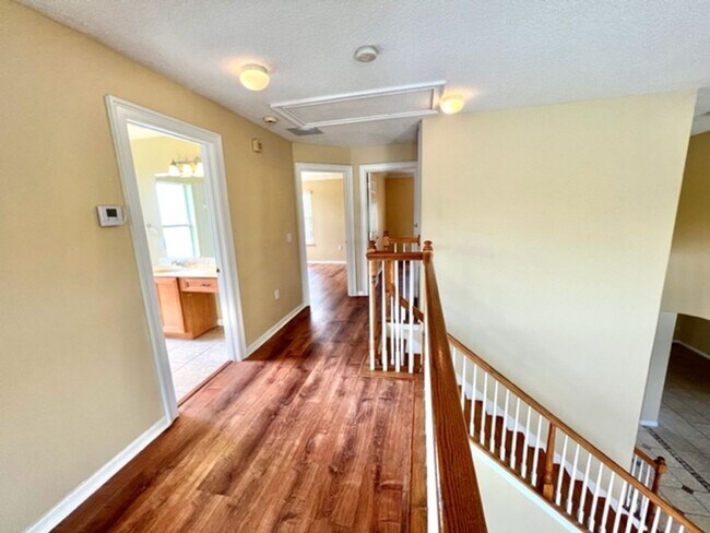 Building Photo - EAGLE CREEK LAKE NONA! WELCOME HOME! Beautiful water views! Spacious 2 story-3 bedroom 2.5 bath h...