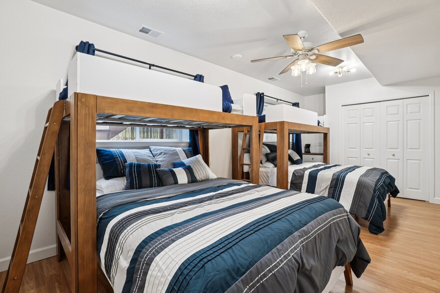 The basement bedroom has room for two queen bed bunk sets! - 941 Reynolds Farm Ln