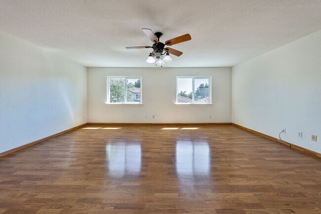 Building Photo - Spacious 4-Bedroom Home, Beautifully Maint...