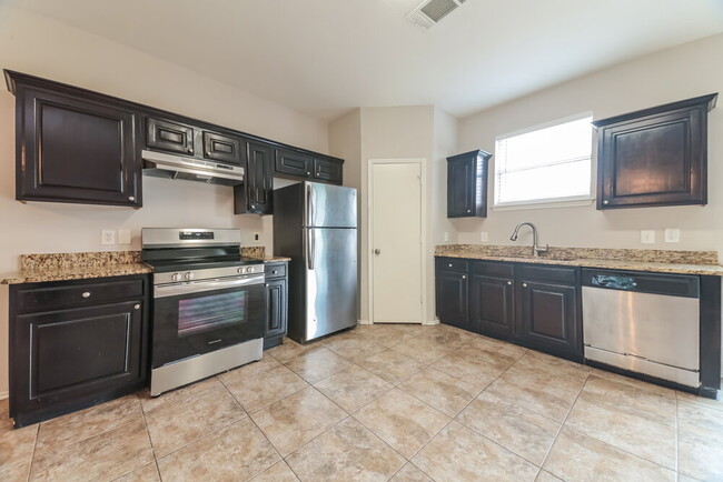 Building Photo - 9727 Checota Dr