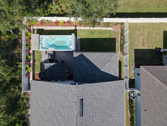Building Photo - "Luxurious Furnished Home with 4-Bed, 3-Bath, Swim Spa Fenced Yard Golf Cart steps to the beach!"
