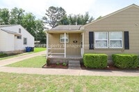 Building Photo - Gorgeous duplex unit on large lot with garage -- NO PETS ALLOWED