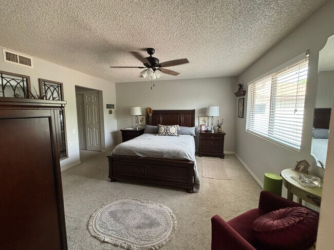 Building Photo - Enjoy this cozy 2 Bedroom, 1.75 Bathrooms, 1.5 Car Garage home in Premier Active Adult Resort Sty...