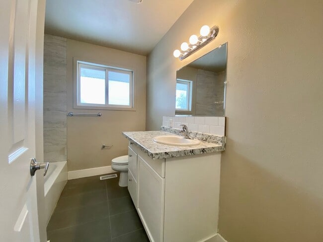 Building Photo - Renovated Home Surrounded By Scenic Orchard Bliss