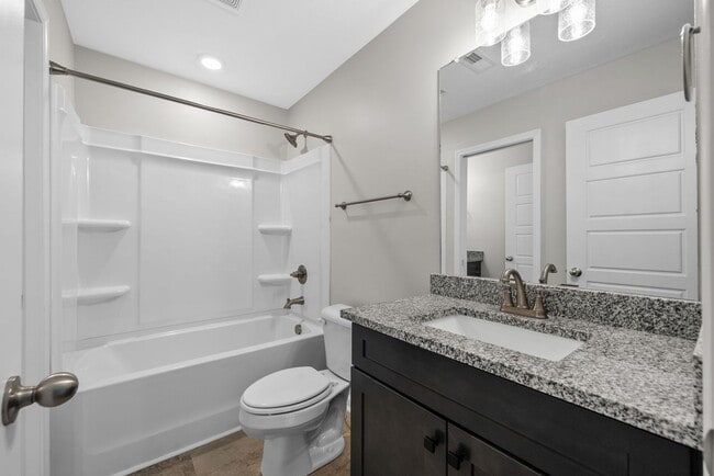 Building Photo - Pet Friendly Three Bedroom!