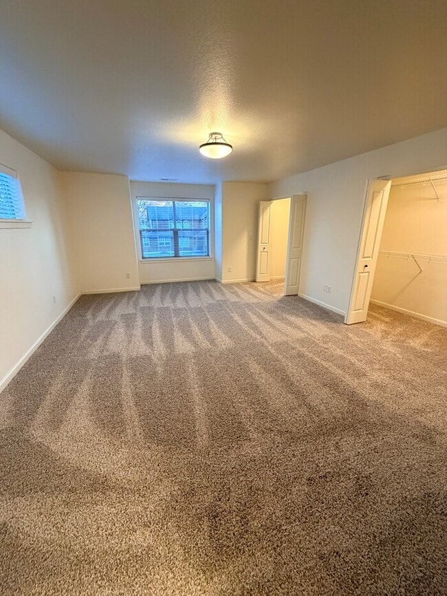 Building Photo - Beautiful Home w/Gas Fireplace, Plank Flooring, Fenced Yard, Garage, W/D & MORE!