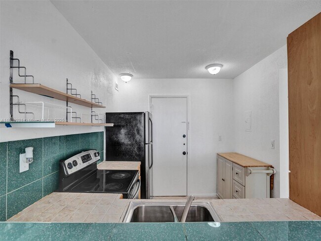 Building Photo - 8233 Harding Ave