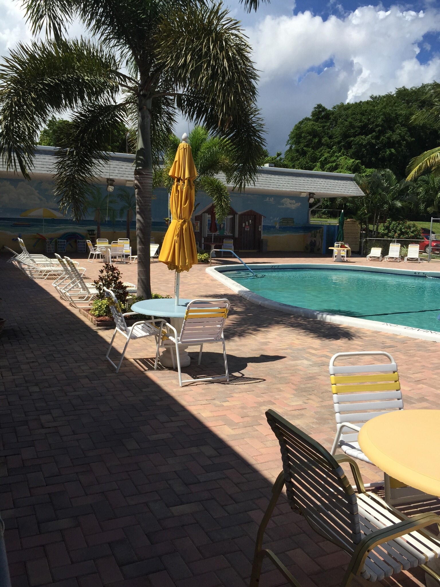 Tables by Pool - 2960 Lake Osborne Dr