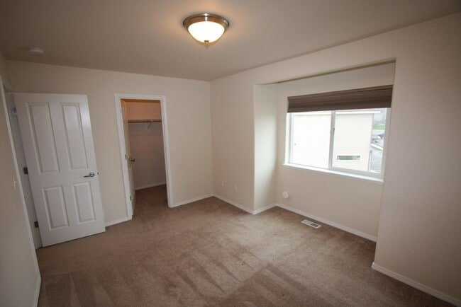 Building Photo - 3 Bedroom East Anchorage Condo w/ Fenced Yard!