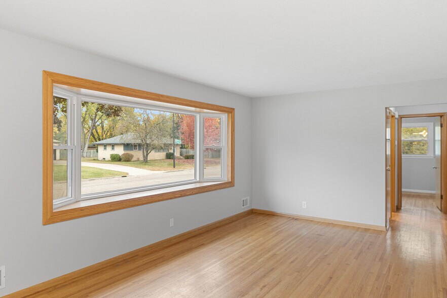 New paint, fixtures and flooring throughout! - 7131 Ewing Ave N