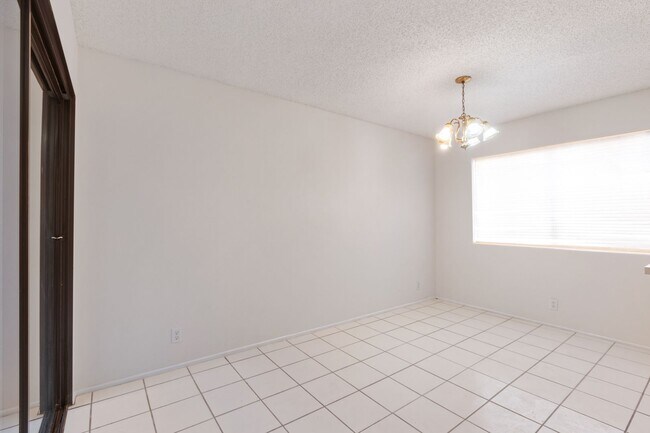 Building Photo - Tri-Level Townhome with Bonus Room | Ranch Los Charcos