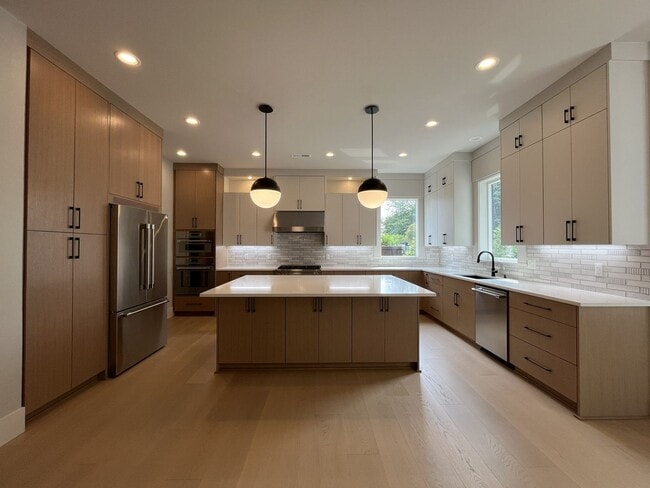 Building Photo - Brand-New 5-Bedroom Home with Main-Level Suite, Gourmet Kitchen, Luxury Finishes & Covered Patio