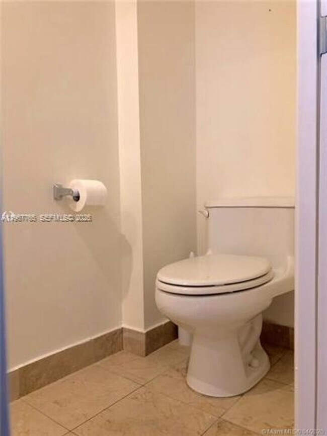 Building Photo - 6917 Collins Ave