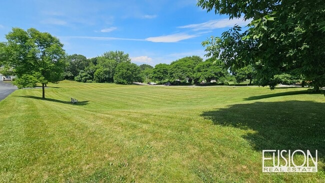 Building Photo - FREE July Rent for this Quiet, Four Bedroo...