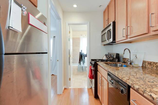 Kitchen w stainless steel appliances - 94 Webster St NE