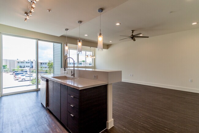 Building Photo - Stunning 2/2.5 multi-level Skybridge Lofts...