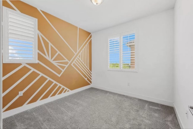 Building Photo - Dream Home Alert: 5 Bedrooms of Pure Comfo...