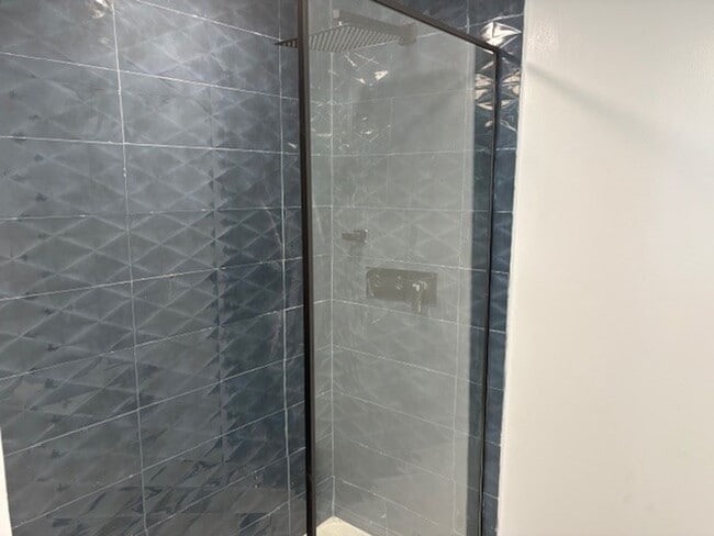 Building Photo - Step into modern luxury right here in Bloo...