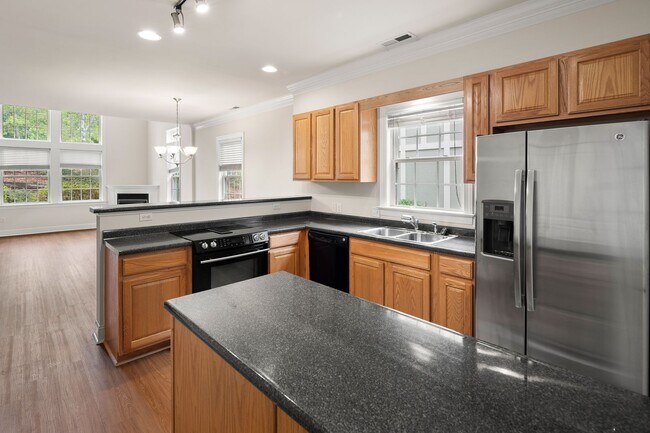 Building Photo - Five-Bedroom Tudor Home with Main-Level Primary Suite in Albemarle Reserve