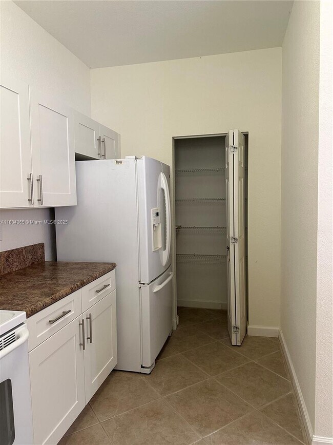 Building Photo - 12852 SW 133rd Terrace