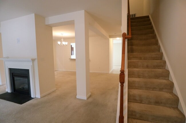 Building Photo - Spacious 4BR Home with Garage Steps from C...