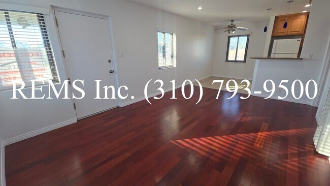 Building Photo - Refurbished Upstairs Apartment with Garage parking