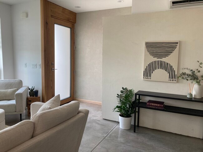 Front door and entry into living room - 438 N Stone Mountain Dr