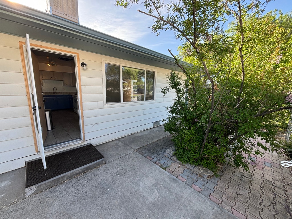 Side entrance into kitchen. - 1718 White Ave