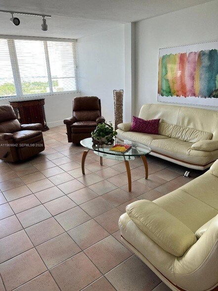 Building Photo - 5005 Collins Ave