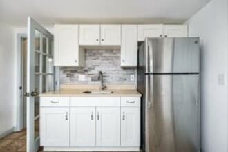 Building Photo - Renovated 4BR with In-Unit Laundry Near Moody Street