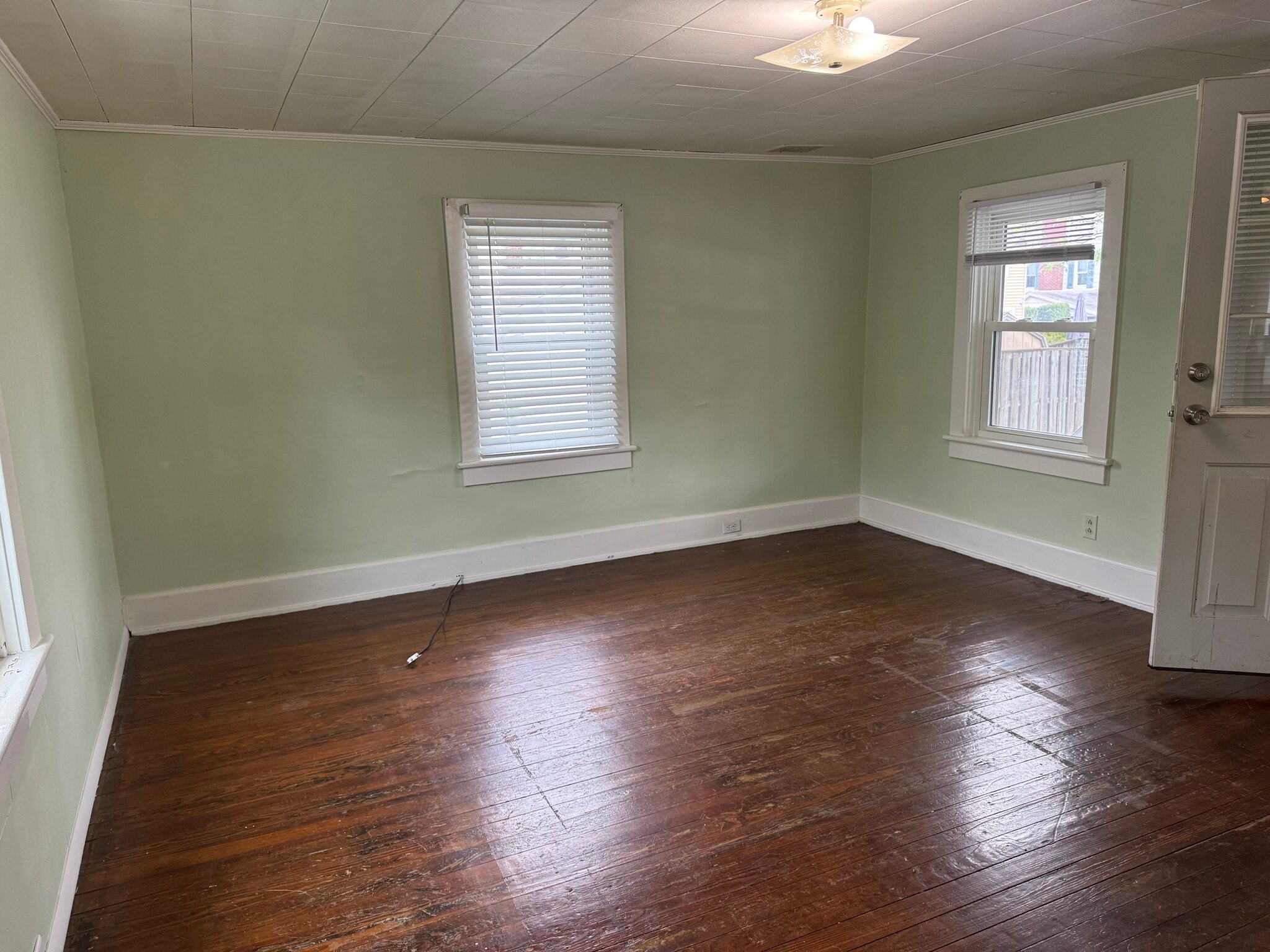 Living Room-prior to paint and lighting and floor upgrade - 351 Lyons Ave