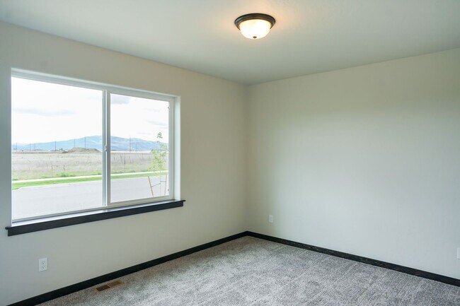 Building Photo - Newly built home with 3 car garage