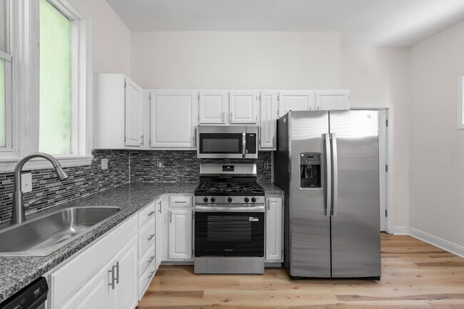 Building Photo - Fully Renovated Three Bedroom Two Bathroom Home