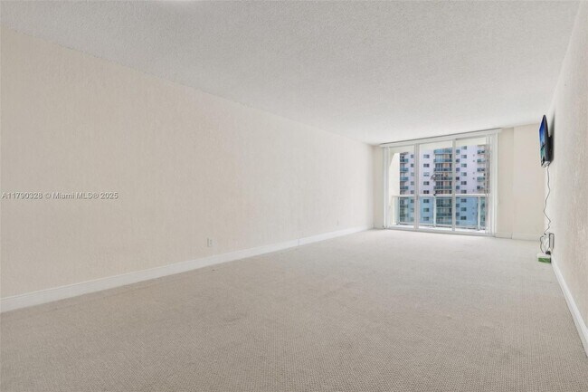 Building Photo - 19390 Collins Ave