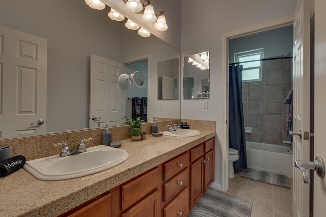 2nd floor full bath. Tub/Shower combo with dual vanity sinks - 1698 Gemtown Dr