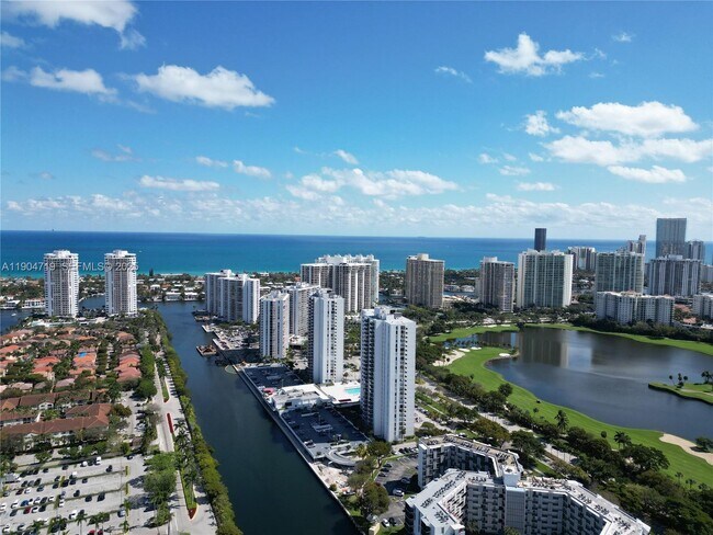 Building Photo - 3675 N Country Club Dr