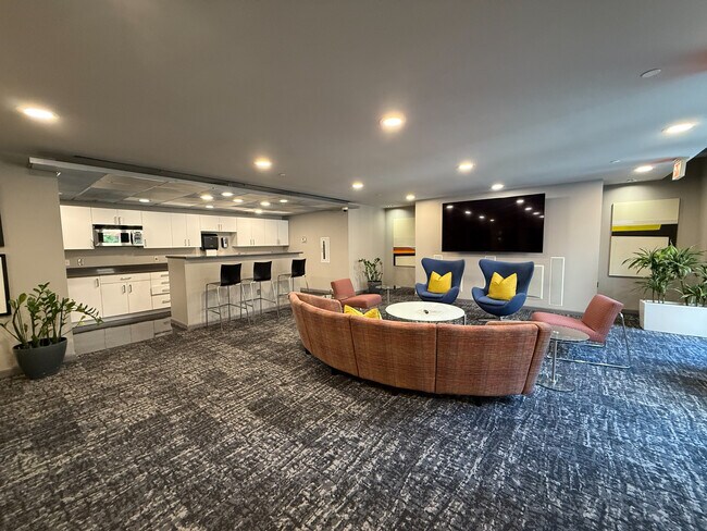 Large TV and Stereo, Bar area and more in the community room. - 1300 N St NW