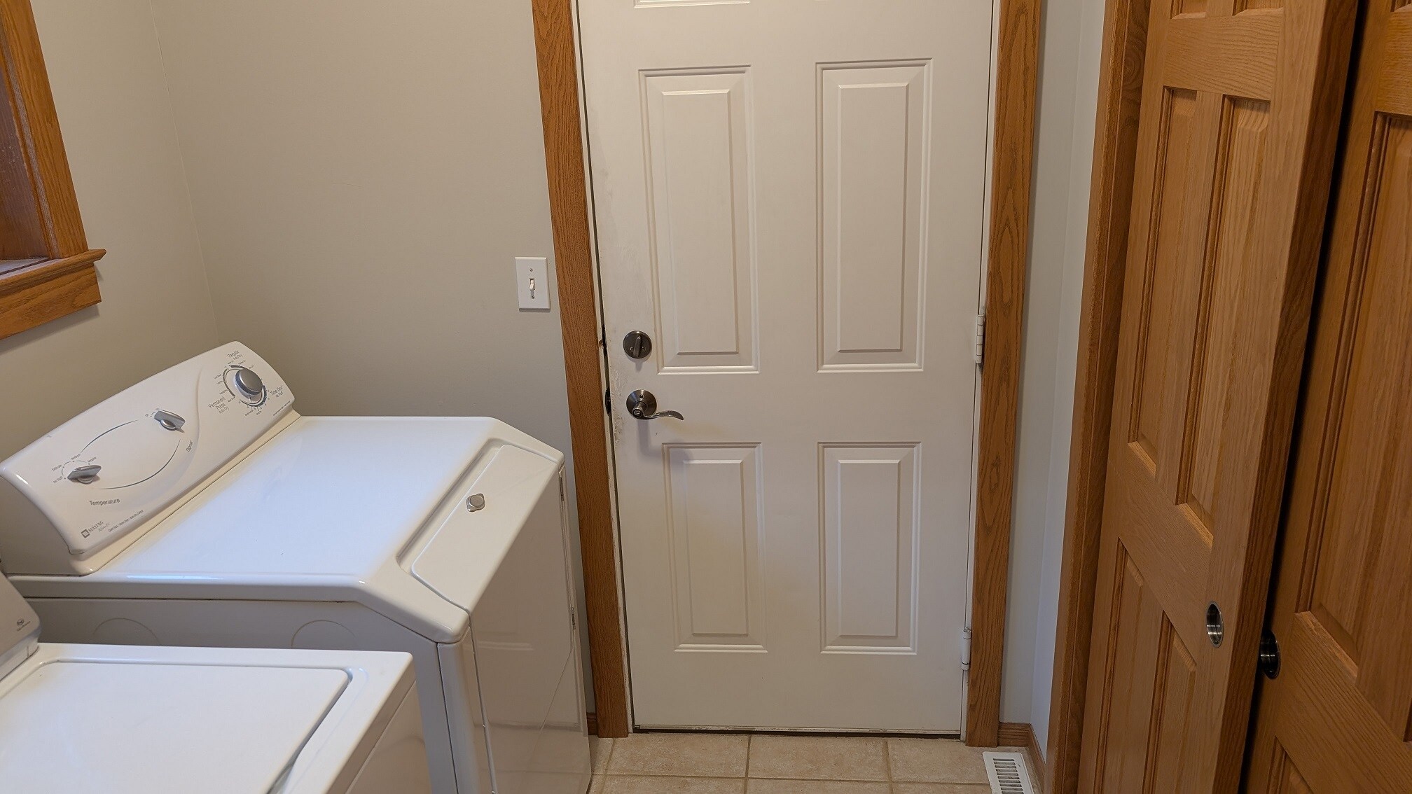 Laundry room and access to garage - 2669 Kathleen Ln NE