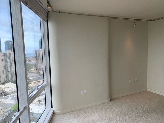 Building Photo - Moana Pacific - 2 bedroom plus den, 2 bath Condo with 2 parking - avail now!